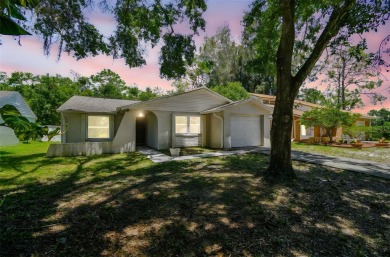 Welcome to this beautifully updated 3-bedroom, 2-bathroom block on Northdale Golf and Tennis Club in Florida - for sale on GolfHomes.com, golf home, golf lot