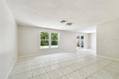Welcome to this beautifully updated 3-bedroom, 2-bathroom block on Northdale Golf and Tennis Club in Florida - for sale on GolfHomes.com, golf home, golf lot