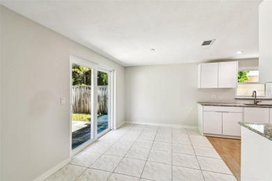 Welcome to this beautifully updated 3-bedroom, 2-bathroom block on Northdale Golf and Tennis Club in Florida - for sale on GolfHomes.com, golf home, golf lot