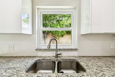 Welcome to this beautifully updated 3-bedroom, 2-bathroom block on Northdale Golf and Tennis Club in Florida - for sale on GolfHomes.com, golf home, golf lot
