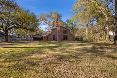 This home delivers immediate curb appeal with a generous front on Hide-A-Way Lake Golf Course in Texas - for sale on GolfHomes.com, golf home, golf lot