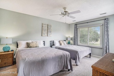 Welcome to 815 Colony Drive, Unit F, in beautiful Sunset Beach on Sea Trail Golf Resort in North Carolina - for sale on GolfHomes.com, golf home, golf lot