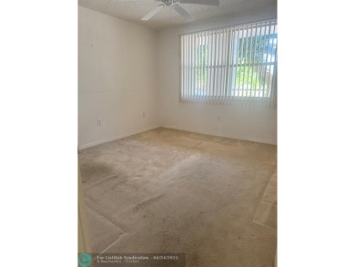 Enjoy this large 2 Bed 2 Bath Condo ready to make it your own on Sunrise Lakes Phase IV Golf Course in Florida - for sale on GolfHomes.com, golf home, golf lot