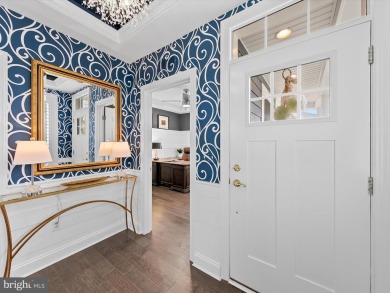 Exquisite coastal-style home perfectly situated on a premium lot on The Peninsula Golf and Country Club in Delaware - for sale on GolfHomes.com, golf home, golf lot
