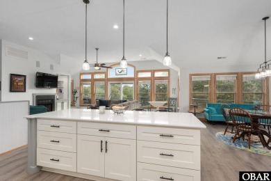This beautifully updated and versatile coastal retreat offers on Duck Woods Country Club in North Carolina - for sale on GolfHomes.com, golf home, golf lot