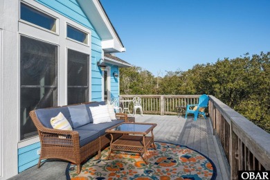 This beautifully updated and versatile coastal retreat offers on Duck Woods Country Club in North Carolina - for sale on GolfHomes.com, golf home, golf lot