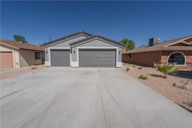 Located at 1707 Golden Gate Ave in Kingman, Arizona, this new on Cerbat Cliffs Golf Course in Arizona - for sale on GolfHomes.com, golf home, golf lot