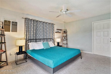 Welcome to 815 Colony Drive, Unit F, in beautiful Sunset Beach on Sea Trail Golf Resort in North Carolina - for sale on GolfHomes.com, golf home, golf lot