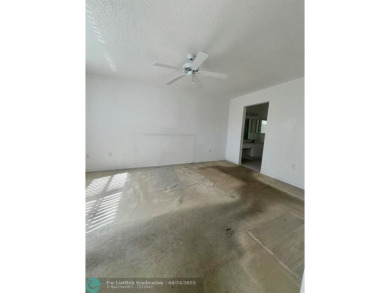 Enjoy this large 2 Bed 2 Bath Condo ready to make it your own on Sunrise Lakes Phase IV Golf Course in Florida - for sale on GolfHomes.com, golf home, golf lot