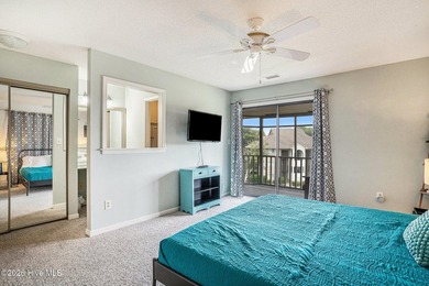 Welcome to 815 Colony Drive, Unit F, in beautiful Sunset Beach on Sea Trail Golf Resort in North Carolina - for sale on GolfHomes.com, golf home, golf lot