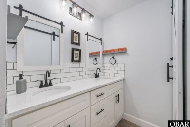 This beautifully updated and versatile coastal retreat offers on Duck Woods Country Club in North Carolina - for sale on GolfHomes.com, golf home, golf lot