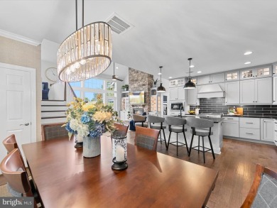 Exquisite coastal-style home perfectly situated on a premium lot on The Peninsula Golf and Country Club in Delaware - for sale on GolfHomes.com, golf home, golf lot