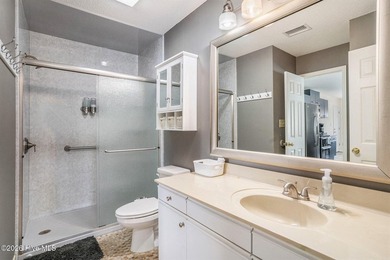 Welcome to 815 Colony Drive, Unit F, in beautiful Sunset Beach on Sea Trail Golf Resort in North Carolina - for sale on GolfHomes.com, golf home, golf lot