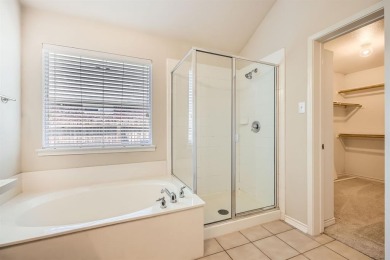 This beautifully maintained 4-bedroom, 2-bathroom home in the on WestRidge Golf Course in Texas - for sale on GolfHomes.com, golf home, golf lot