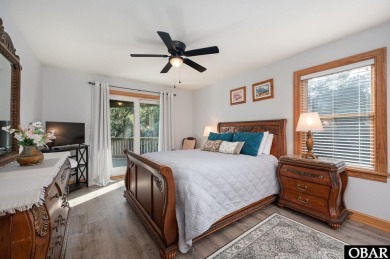 This beautifully updated and versatile coastal retreat offers on Duck Woods Country Club in North Carolina - for sale on GolfHomes.com, golf home, golf lot