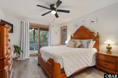 This beautifully updated and versatile coastal retreat offers on Duck Woods Country Club in North Carolina - for sale on GolfHomes.com, golf home, golf lot
