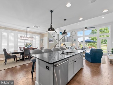 Exquisite coastal-style home perfectly situated on a premium lot on The Peninsula Golf and Country Club in Delaware - for sale on GolfHomes.com, golf home, golf lot