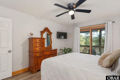 This beautifully updated and versatile coastal retreat offers on Duck Woods Country Club in North Carolina - for sale on GolfHomes.com, golf home, golf lot