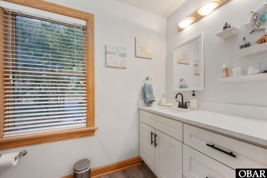 This beautifully updated and versatile coastal retreat offers on Duck Woods Country Club in North Carolina - for sale on GolfHomes.com, golf home, golf lot