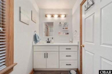 This beautifully updated and versatile coastal retreat offers on Duck Woods Country Club in North Carolina - for sale on GolfHomes.com, golf home, golf lot