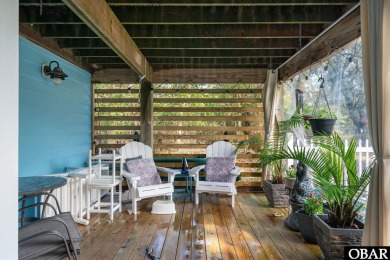 This beautifully updated and versatile coastal retreat offers on Duck Woods Country Club in North Carolina - for sale on GolfHomes.com, golf home, golf lot