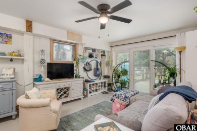 This beautifully updated and versatile coastal retreat offers on Duck Woods Country Club in North Carolina - for sale on GolfHomes.com, golf home, golf lot