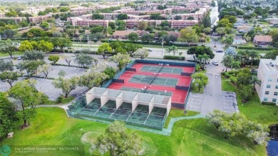 Enjoy this large 2 Bed 2 Bath Condo ready to make it your own on Sunrise Lakes Phase IV Golf Course in Florida - for sale on GolfHomes.com, golf home, golf lot