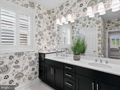 Exquisite coastal-style home perfectly situated on a premium lot on The Peninsula Golf and Country Club in Delaware - for sale on GolfHomes.com, golf home, golf lot