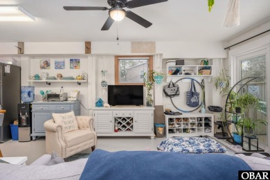 This beautifully updated and versatile coastal retreat offers on Duck Woods Country Club in North Carolina - for sale on GolfHomes.com, golf home, golf lot