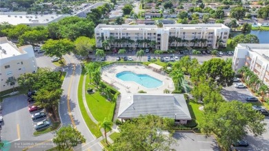 Enjoy this large 2 Bed 2 Bath Condo ready to make it your own on Sunrise Lakes Phase IV Golf Course in Florida - for sale on GolfHomes.com, golf home, golf lot