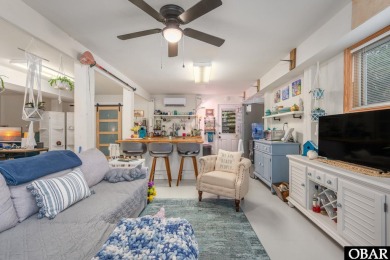This beautifully updated and versatile coastal retreat offers on Duck Woods Country Club in North Carolina - for sale on GolfHomes.com, golf home, golf lot