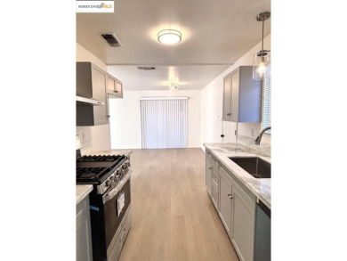Step into this spectacular renovated 3 bedroom and 2 bathroom on Bing Maloney Golf Course in California - for sale on GolfHomes.com, golf home, golf lot