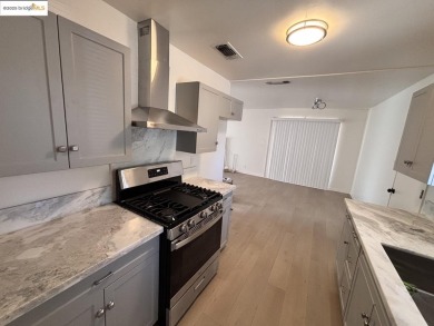 Step into this spectacular renovated 3 bedroom and 2 bathroom on Bing Maloney Golf Course in California - for sale on GolfHomes.com, golf home, golf lot