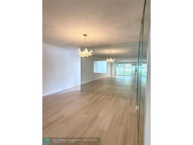 Do not miss this desirable FIRST floor corner unit. This unit is on Wynmoor Golf Course in Florida - for sale on GolfHomes.com, golf home, golf lot