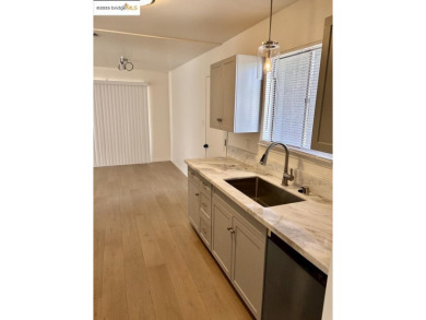 Step into this spectacular renovated 3 bedroom and 2 bathroom on Bing Maloney Golf Course in California - for sale on GolfHomes.com, golf home, golf lot