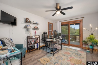 This beautifully updated and versatile coastal retreat offers on Duck Woods Country Club in North Carolina - for sale on GolfHomes.com, golf home, golf lot