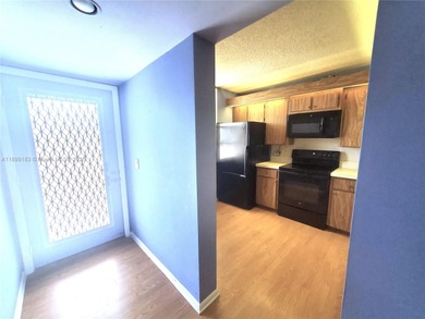 A hidden gem! Spacious 1,385 SF 2-bedroom, 2-bath unit with an on Pine Island Ridge Country Club in Florida - for sale on GolfHomes.com, golf home, golf lot