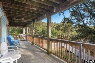 This beautifully updated and versatile coastal retreat offers on Duck Woods Country Club in North Carolina - for sale on GolfHomes.com, golf home, golf lot