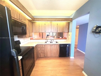 A hidden gem! Spacious 1,385 SF 2-bedroom, 2-bath unit with an on Pine Island Ridge Country Club in Florida - for sale on GolfHomes.com, golf home, golf lot