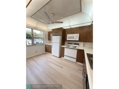 Do not miss this desirable FIRST floor corner unit. This unit is on Wynmoor Golf Course in Florida - for sale on GolfHomes.com, golf home, golf lot