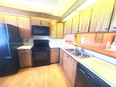 A hidden gem! Spacious 1,385 SF 2-bedroom, 2-bath unit with an on Pine Island Ridge Country Club in Florida - for sale on GolfHomes.com, golf home, golf lot