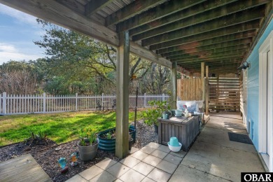 This beautifully updated and versatile coastal retreat offers on Duck Woods Country Club in North Carolina - for sale on GolfHomes.com, golf home, golf lot