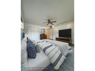 Do not miss this desirable FIRST floor corner unit. This unit is on Wynmoor Golf Course in Florida - for sale on GolfHomes.com, golf home, golf lot