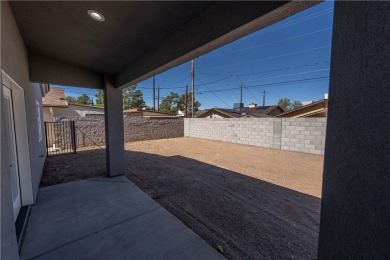 Located at 1707 Golden Gate Ave in Kingman, Arizona, this new on Cerbat Cliffs Golf Course in Arizona - for sale on GolfHomes.com, golf home, golf lot