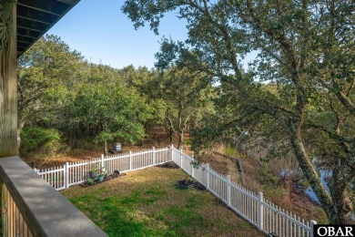 This beautifully updated and versatile coastal retreat offers on Duck Woods Country Club in North Carolina - for sale on GolfHomes.com, golf home, golf lot