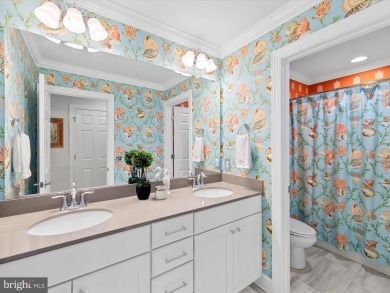 Exquisite coastal-style home perfectly situated on a premium lot on The Peninsula Golf and Country Club in Delaware - for sale on GolfHomes.com, golf home, golf lot
