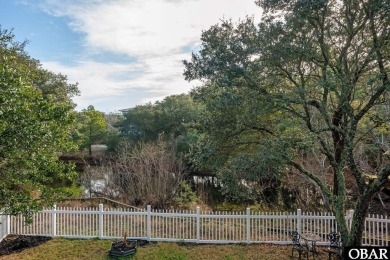 This beautifully updated and versatile coastal retreat offers on Duck Woods Country Club in North Carolina - for sale on GolfHomes.com, golf home, golf lot