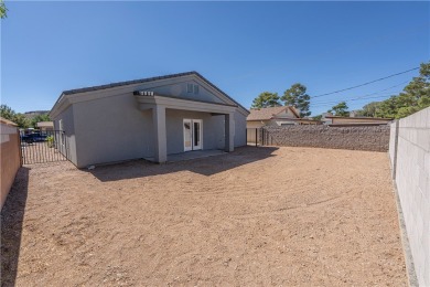 Located at 1707 Golden Gate Ave in Kingman, Arizona, this new on Cerbat Cliffs Golf Course in Arizona - for sale on GolfHomes.com, golf home, golf lot