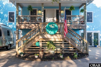 This beautifully updated and versatile coastal retreat offers on Duck Woods Country Club in North Carolina - for sale on GolfHomes.com, golf home, golf lot