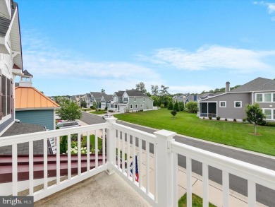 Exquisite coastal-style home perfectly situated on a premium lot on The Peninsula Golf and Country Club in Delaware - for sale on GolfHomes.com, golf home, golf lot